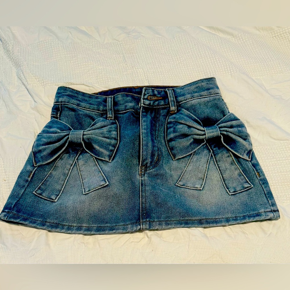 Shenhe light denim XS mini skirt. New from
Amazon. 2.5-3 inch.